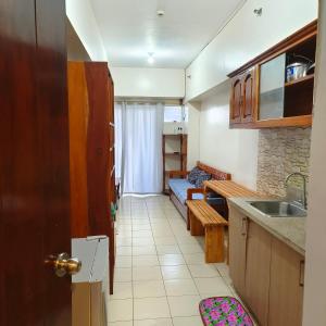 Ảnh trong thư viện ảnh của Affordable 2BR Condo with WIFI near town - 201 ở Baguio