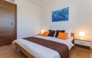 Postel nebo postele na pokoji v ubytování VillaBlu1 Doppelhaushälfte Seaview, Pool