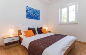 Postel nebo postele na pokoji v ubytování VillaBlu1 Doppelhaushälfte Seaview, Pool
