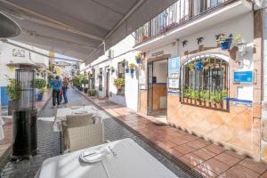Reštaurácia alebo iné gastronomické zariadenie v ubytovaní Las Brisas Estepona