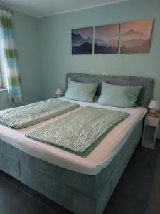 Postel nebo postele na pokoji v ubytování Ferienwohnung Sarah & Thorsten Blum