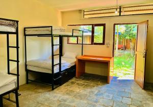 Katil atau katil-katil dalam bilik di Sunakhari Hostel
