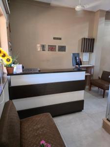 TV a/nebo společenská místnost v ubytování HOTEL CARDINAL Pedro Juan Caballero