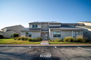 a house with a solar roof on a street at The Cobalt Crab Oasis in Rockport