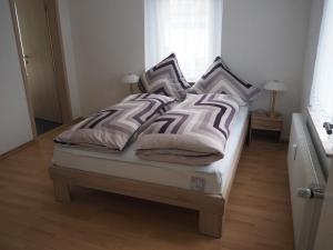 Postel nebo postele na pokoji v ubytování Ferienwohnung am Bach