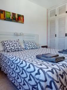 Postel nebo postele na pokoji v ubytování Villas Reina