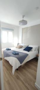 Ένα ή περισσότερα κρεβάτια σε δωμάτιο στο Casa Birdie, 3 bedrooms, perfect for golf and cycling, all amenities by the doorstep +22 φωτογραφίες