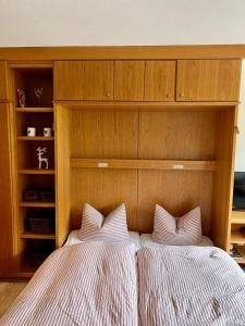 Cama o camas de una habitación en Fewo im Sonnenpark