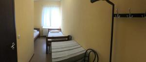 Posteľ alebo postele v izbe v ubytovaní Guest House KARTA F M