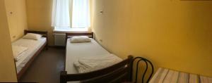 Posteľ alebo postele v izbe v ubytovaní Guest House KARTA F M