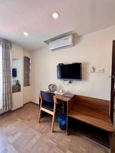 TV o dispositivi per l'intrattenimento presso Hotel next home