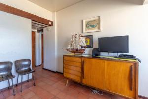 TV a/nebo společenská místnost v ubytování Casa da Falésia by DolceStay