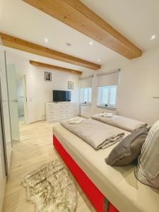 a bedroom with a large bed in a room at Wohnung 3 Am Schlosspark in Bad Harzburg