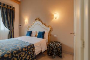 FloVe' Rooms Venice客房内的一张或多张床位
