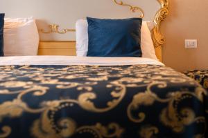 FloVe' Rooms Venice客房内的一张或多张床位