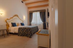FloVe' Rooms Venice客房内的一张或多张床位