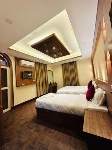 Letto o letti in una camera di Lazimpat Boutique Hotel