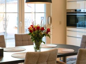 TV/Unterhaltungsangebot in der Unterkunft Lüftenblick - Ferienwohnungen am Starnberger See, mit Terrasse, Weitblick, Sauna, Kamin, E-Ladestation