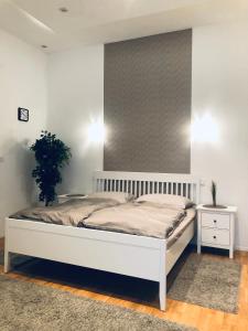 Posteľ alebo postele v izbe v ubytovaní Diamond Apartman + 10 fotografií