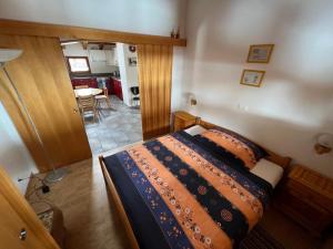 Letto o letti in una camera di Angela