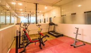 a gym with two exercise bikes in a room at Heistel Gurugram in Gurgaon
