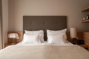 Postel nebo postele na pokoji v ubytování Hotel Schwarzschmied