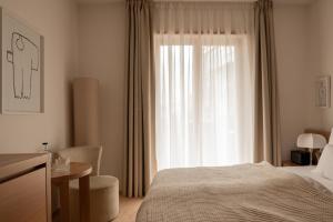 Postel nebo postele na pokoji v ubytování Hotel Schwarzschmied