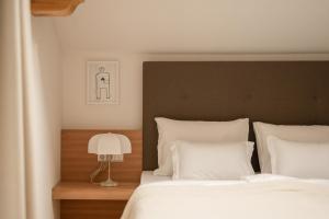Postel nebo postele na pokoji v ubytování Hotel Schwarzschmied