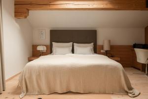 Postel nebo postele na pokoji v ubytování Hotel Schwarzschmied