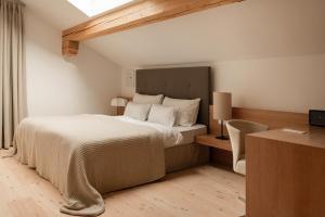 Postel nebo postele na pokoji v ubytování Hotel Schwarzschmied
