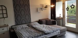 Ein Bett oder Betten in einem Zimmer der Unterkunft Fewo 8 Steffens