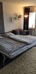 Ein Bett oder Betten in einem Zimmer der Unterkunft Fewo 8 Steffens