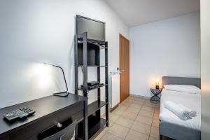 Letto o letti in una camera di YD Settimello with parking