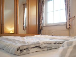 Postel nebo postele na pokoji v ubytování FeWo "Stems - W4"
