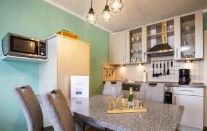 Galeriebild der Unterkunft Ferien Reihenhaus Wohnung Nr 8 in Werdum