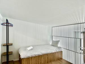 Postel nebo postele na pokoji v ubytování Hotel Krebuli