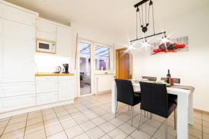 Kuchyň nebo kuchyňský kout v ubytování Ferienwohnung Bernd + 12 fotografií