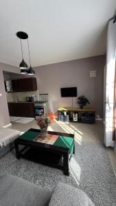 a living room with a couch and a table at FlexHomes-Ongata Rongai in Ongata Rongai 