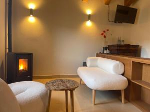 Les Flors - Hotel Rural & Cabanyes的休息区