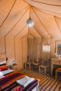 Postel nebo postele na pokoji v ubytování Royal Luxury Camp