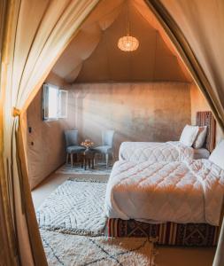 Postel nebo postele na pokoji v ubytování Royal Luxury Camp