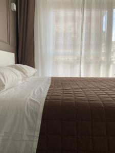Postel nebo postele na pokoji v ubytování Quintino Sella rooms