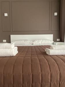 Postel nebo postele na pokoji v ubytování Quintino Sella rooms