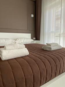 Postel nebo postele na pokoji v ubytování Quintino Sella rooms + 8 fotografií