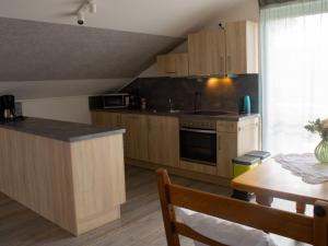 Kuchyň nebo kuchyňský kout v ubytování Ferienwohnung Gute Zeit - Apartment 1