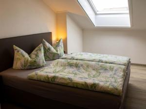 Postel nebo postele na pokoji v ubytování Ferienwohnung Gute Zeit - Apartment 1