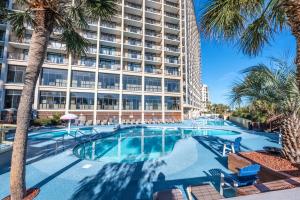 Бассейн в 1BR Oceanfront Condo, Beach Cove, Pools, Hot Tubs! или поблизости