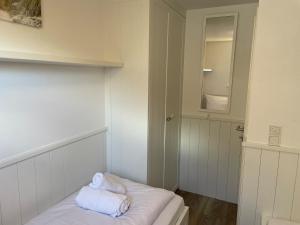 Postel nebo postele na pokoji v ubytování Ferienwohnung Dünenblick