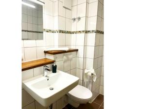 Koupelna v ubytování EasyOne Apartments