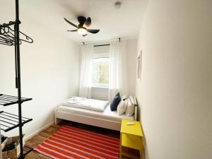 Postel nebo postele na pokoji v ubytování EasyOne Apartments